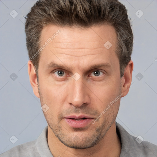 Neutral white adult male with short  brown hair and brown eyes