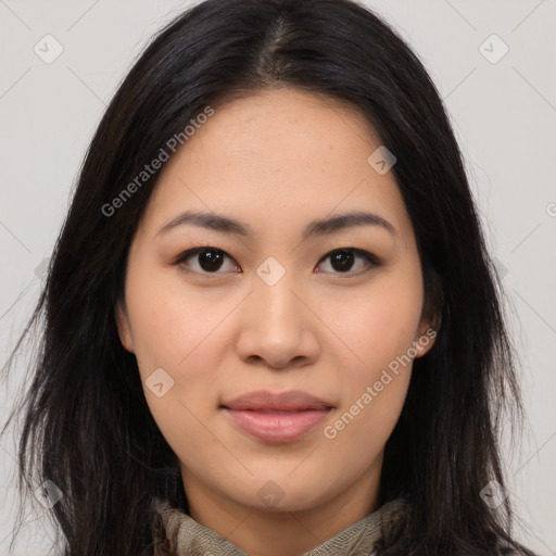 Joyful asian young-adult female with long  brown hair and brown eyes