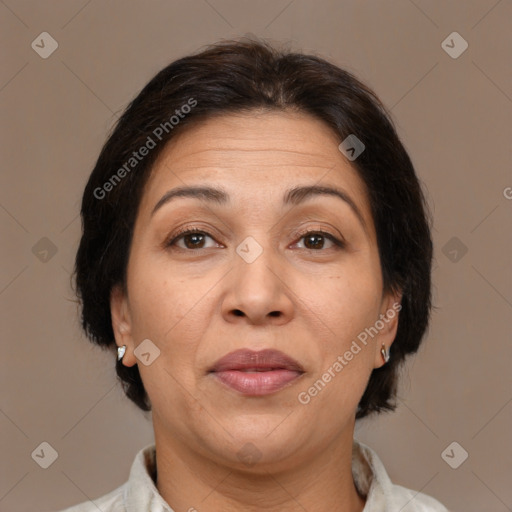 Joyful white adult female with medium  brown hair and brown eyes