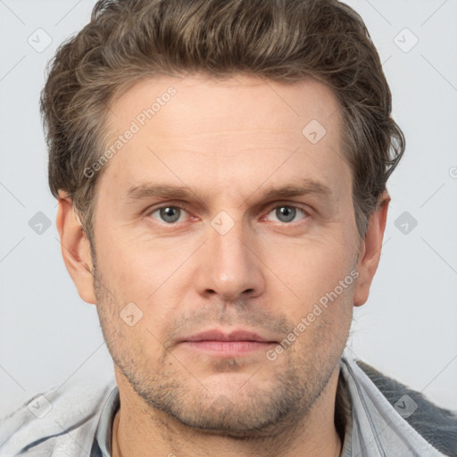 Neutral white adult male with short  brown hair and brown eyes