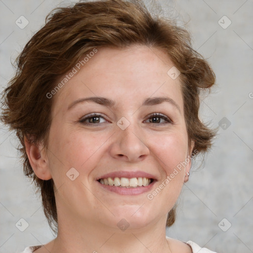 Joyful white adult female with medium  brown hair and blue eyes