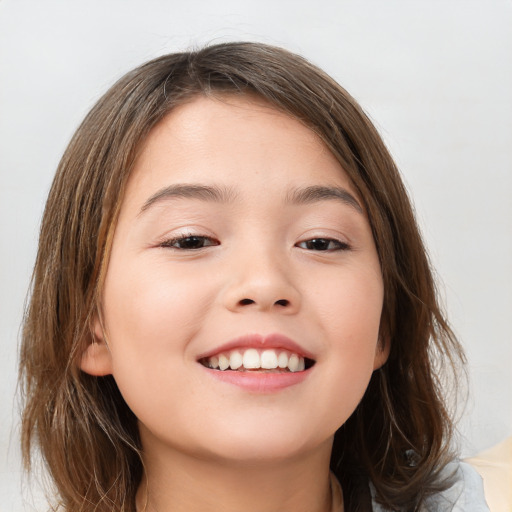 Joyful white child female with medium  brown hair and brown eyes