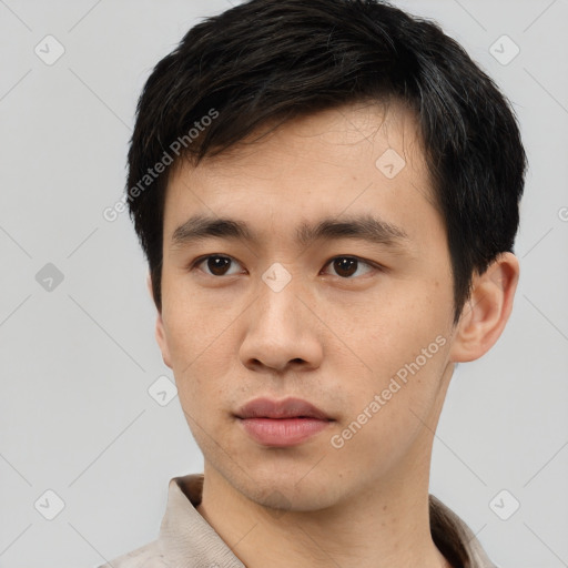 Neutral white young-adult male with short  black hair and brown eyes