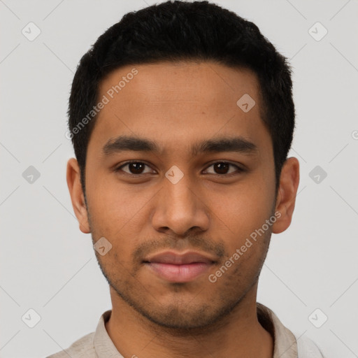 Neutral latino young-adult male with short  black hair and brown eyes