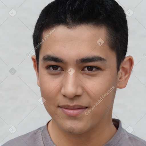 Joyful white young-adult male with short  black hair and brown eyes