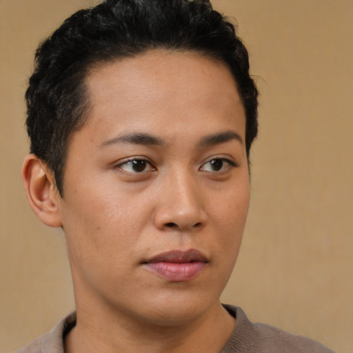 Neutral latino young-adult male with short  brown hair and brown eyes