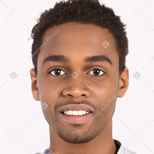 Joyful black young-adult male with short  brown hair and brown eyes