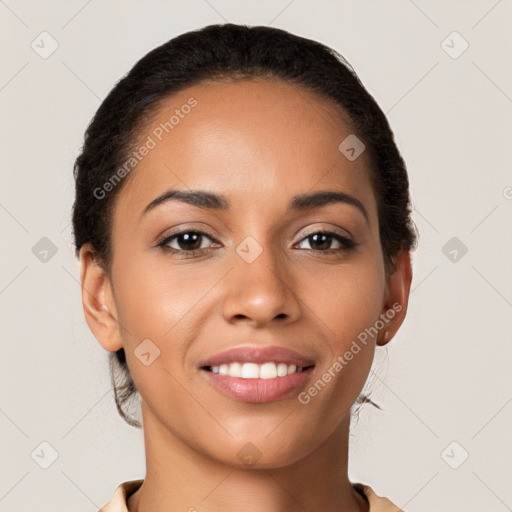 Joyful latino young-adult female with short  brown hair and brown eyes