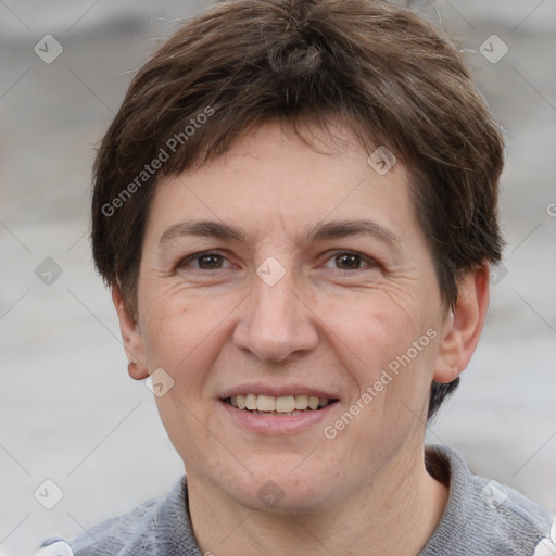 Joyful white adult male with short  brown hair and grey eyes