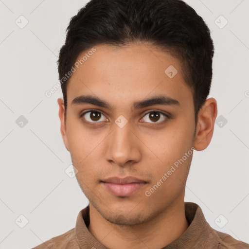 Neutral latino young-adult male with short  brown hair and brown eyes