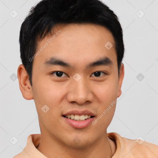 Joyful asian young-adult male with short  black hair and brown eyes