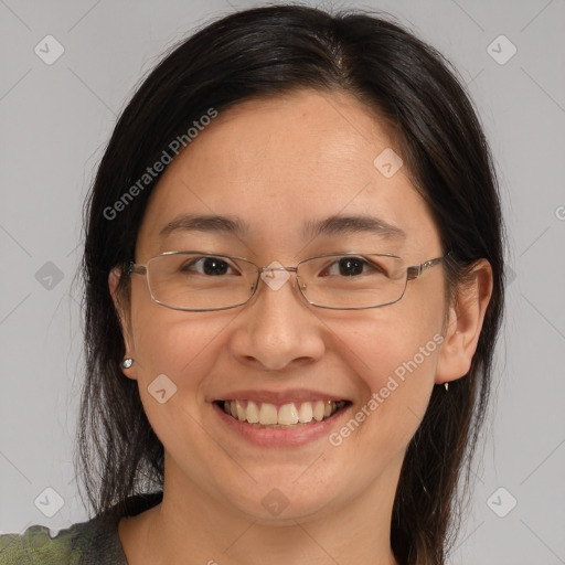 Joyful white adult female with medium  brown hair and brown eyes