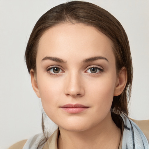 Neutral white young-adult female with medium  brown hair and brown eyes