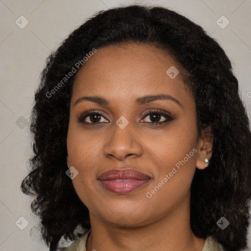 Joyful black young-adult female with medium  black hair and brown eyes