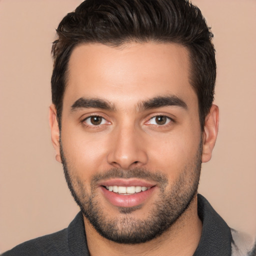 Joyful white young-adult male with short  brown hair and brown eyes