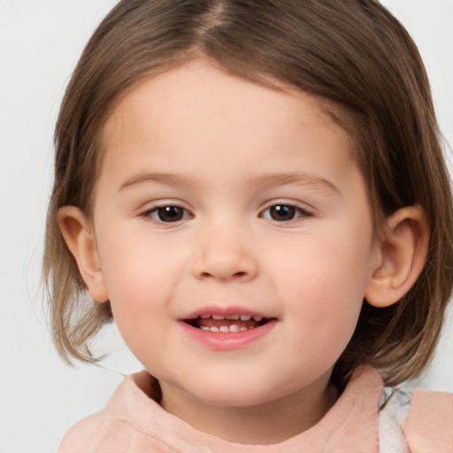 Joyful white child female with medium  brown hair and brown eyes