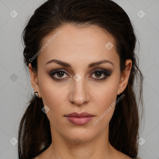 Joyful white young-adult female with long  brown hair and brown eyes