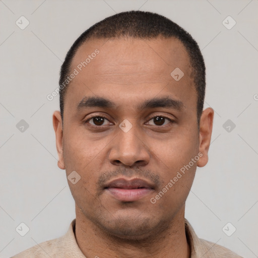 Neutral latino young-adult male with short  black hair and brown eyes