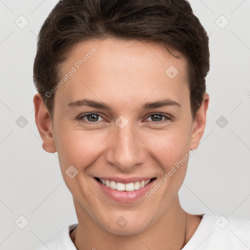 Joyful white young-adult female with short  brown hair and brown eyes