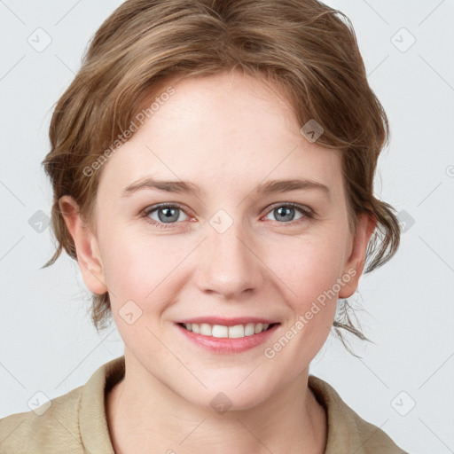 Joyful white young-adult female with medium  brown hair and blue eyes