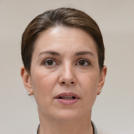 Neutral white adult female with short  brown hair and brown eyes