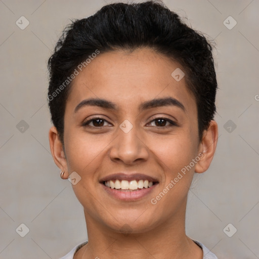 Joyful latino young-adult female with short  brown hair and brown eyes