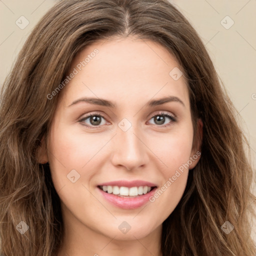 Joyful white young-adult female with long  brown hair and green eyes