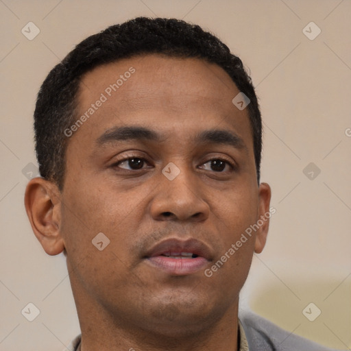 Neutral latino young-adult male with short  brown hair and brown eyes