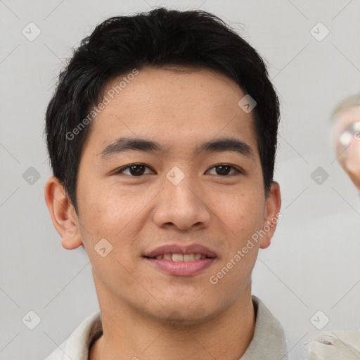 Joyful asian young-adult male with short  brown hair and brown eyes