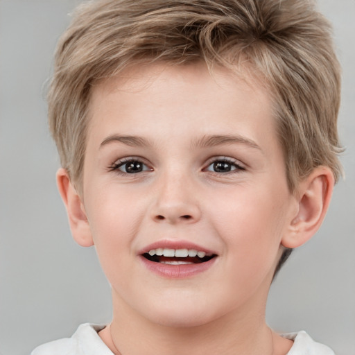 Joyful white child male with short  brown hair and brown eyes