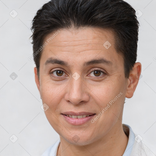 Joyful white adult female with short  brown hair and brown eyes