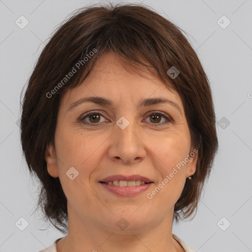 Joyful white adult female with medium  brown hair and brown eyes