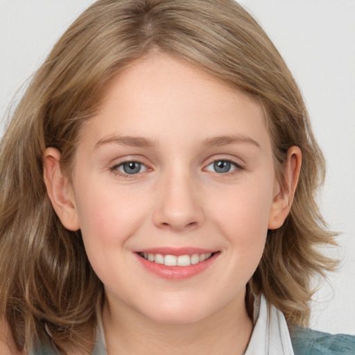 Joyful white young-adult female with medium  brown hair and blue eyes