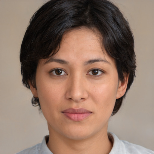 Joyful white young-adult female with medium  brown hair and brown eyes