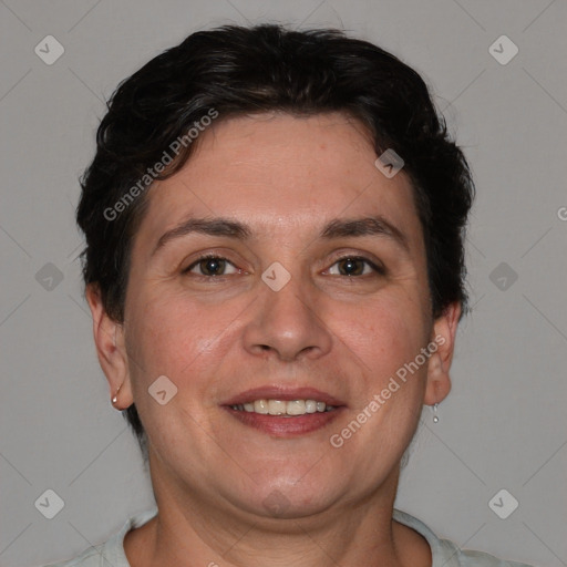 Joyful white adult female with short  brown hair and brown eyes