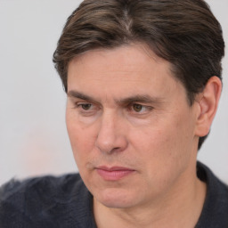 Neutral white adult male with short  brown hair and brown eyes