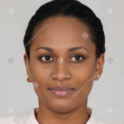 Joyful black young-adult female with short  black hair and brown eyes