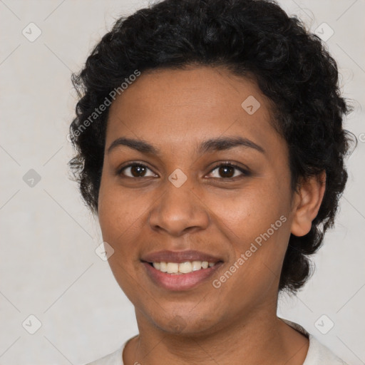 Joyful latino young-adult female with short  black hair and brown eyes