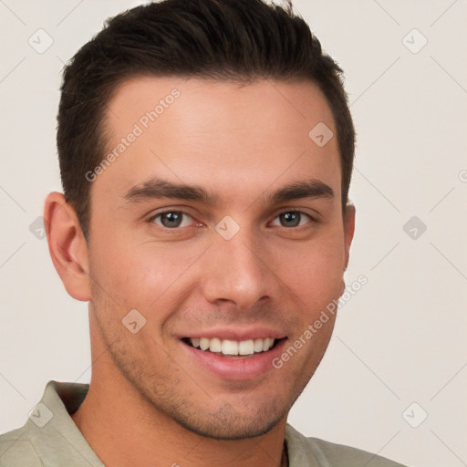 Joyful white young-adult male with short  brown hair and brown eyes