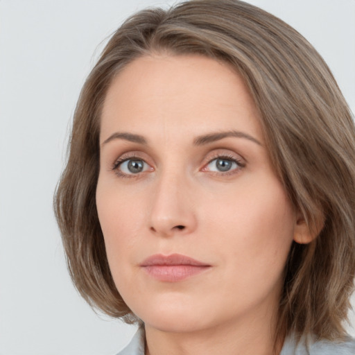 Neutral white young-adult female with medium  brown hair and grey eyes