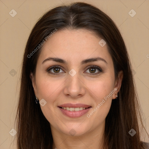 Joyful white young-adult female with long  brown hair and brown eyes