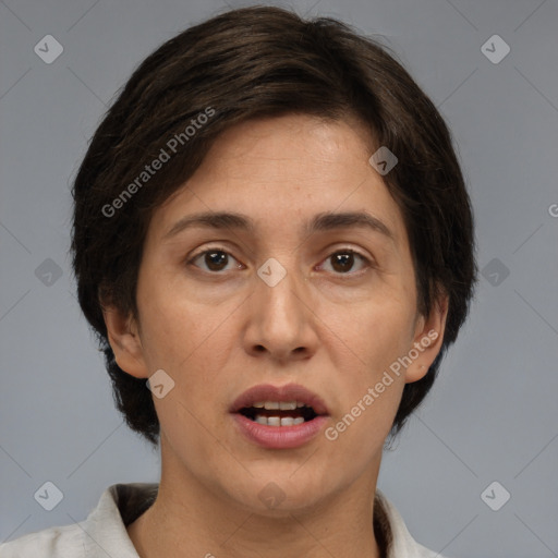 Joyful white adult female with medium  brown hair and brown eyes