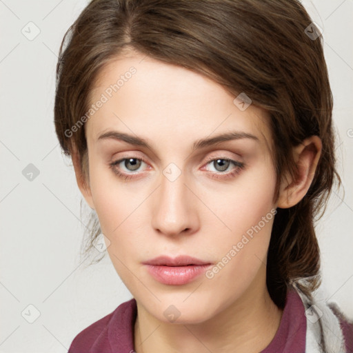 Neutral white young-adult female with medium  brown hair and green eyes