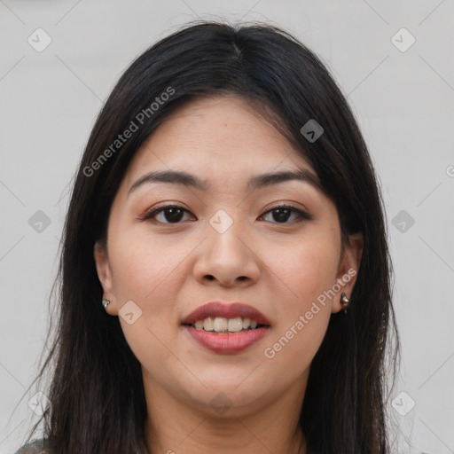 Joyful latino young-adult female with long  brown hair and brown eyes