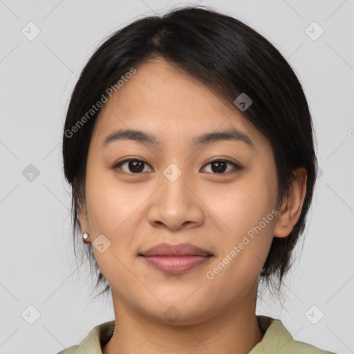 Joyful white young-adult female with medium  black hair and brown eyes