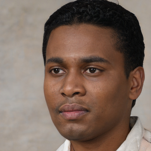 Neutral black young-adult male with short  black hair and brown eyes