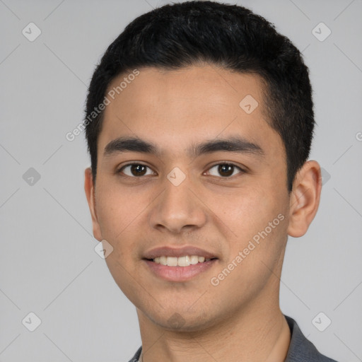 Joyful latino young-adult male with short  black hair and brown eyes