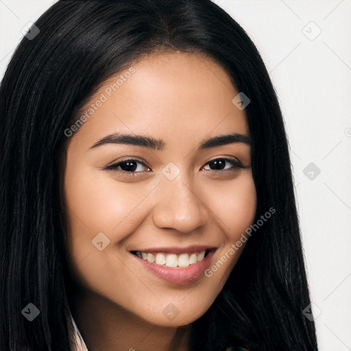 Joyful latino young-adult female with long  brown hair and brown eyes