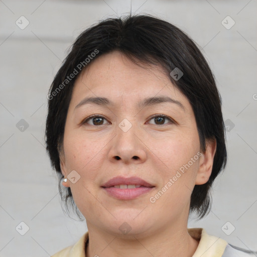 Joyful white adult female with medium  brown hair and brown eyes