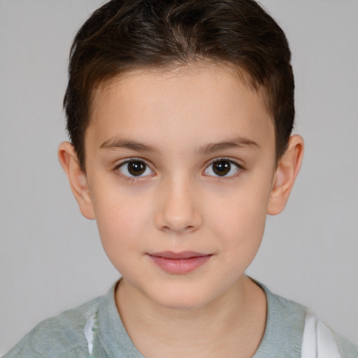 Joyful white child female with short  brown hair and brown eyes